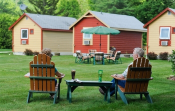Casablanca guests relax in Adirondack chairs